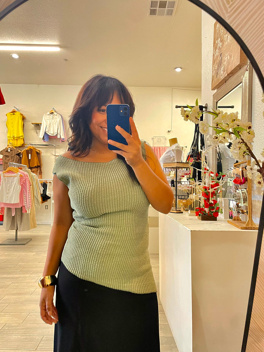 Sleeveless asymmetric hem knit top